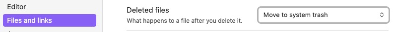 Screenshot of Obsidian application settings showing the 'Deleted files' option with 'Move to system trash' selected.